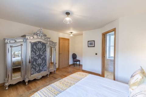 Ornate silver wardrobe in the bedroom