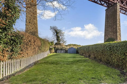 The garden with shed under the bridge approach