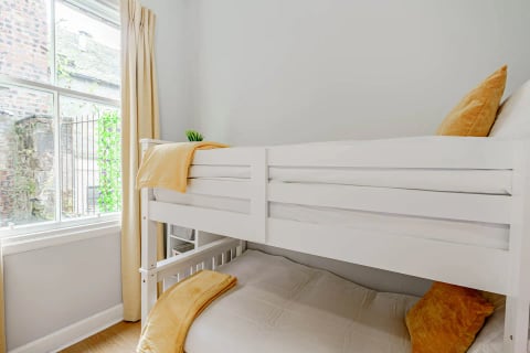 Bunk beds by the window
