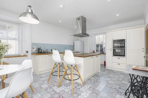 Kitchen island with breakfast stools