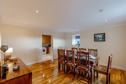 Dining area through to the kitchen and utility