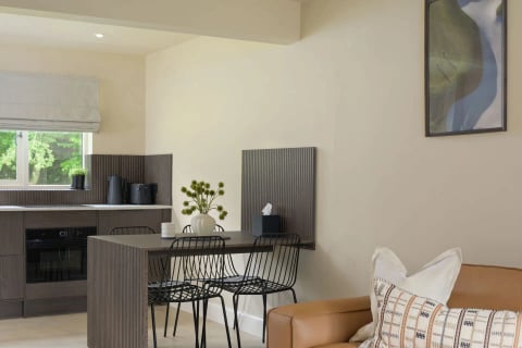 Dining nook with black wire chairs