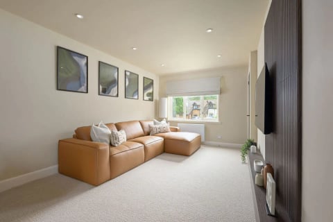 Family room with leather sofa and gallery wall