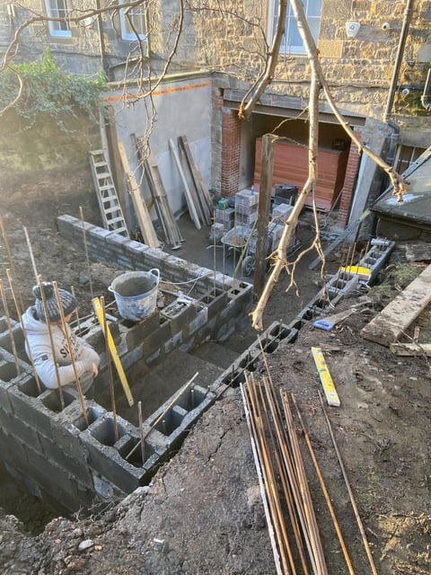 New foundations and blockwork rising for a terraced garden