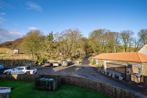 The farm courtyard and outbuildings from the cottage