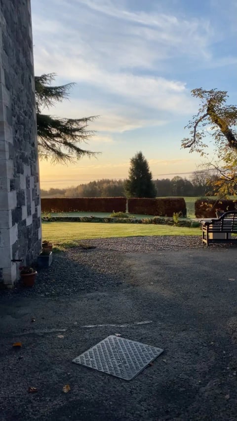 Sunrise over the hedged garden and parkland