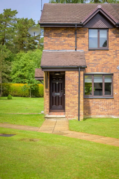 The red-brick frontage from the garden