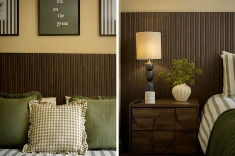 Bedside chest with lamp and vase against the slat wall