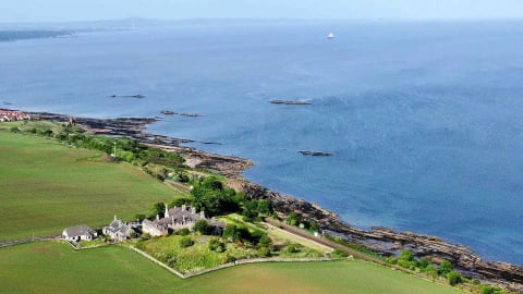 Aerial view of Kinghorn's coastline and the cottage row