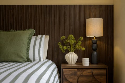 Striped and check cushions with dried-stem styling