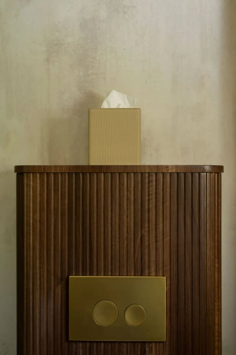 Walnut cabinet with tissue box detail