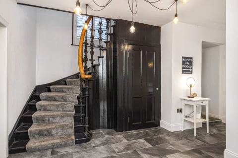 The original jail staircase painted black