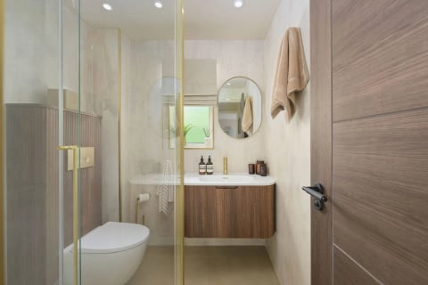 WC with floating vanity and towel hooks