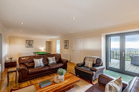 Living room with doors to the deck