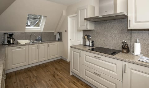 Kitchen with granite worktops and induction hob