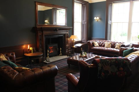 Leather Chesterfields around the open fire