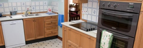 Kitchen with hob island and dining beyond