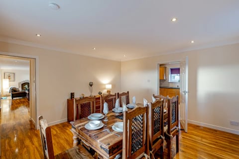 Dining table with lamp and dresser